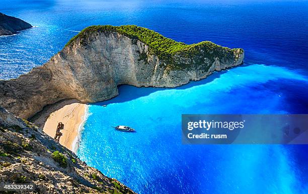 navagio beach (shipwreck beach), zakynthos island, greece. prophoto rgb. - travel panoramic stock pictures, royalty-free photos & images