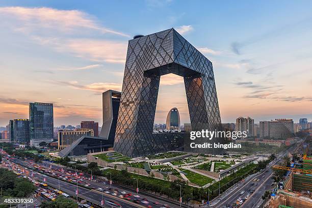 the setting sun, cctv (cctv) is very spectacular. - peking skyline stock pictures, royalty-free photos & images