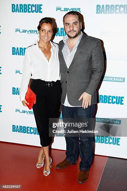 Actor Francois Xavier Demaison and his wife Emmanuelle attend the 'Barbecue' Premiere at Cinema Gaumont Capucine on April 7, 2014 in Paris, France.