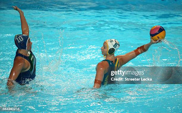 Glennie McGhie of Australia looks to pass with Francesca Pomeri of Italy in the Women's bronze medal match between Australia and Italy on day...