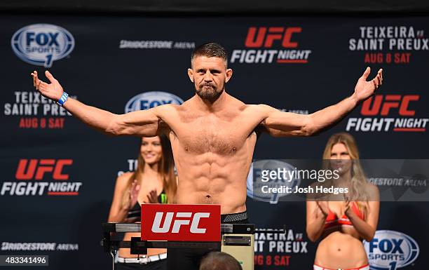 Tom Watson of England steps on the scale during the UFC weigh-in at Bridgestone Arena on August 7, 2015 in Nashville, Tennessee.