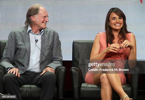 Actors David Bradley and Mia Maestro speak onstage during 'The Strain' panel discussion at the FX portion of the 2015 Summer TCA Tour at The Beverly...
