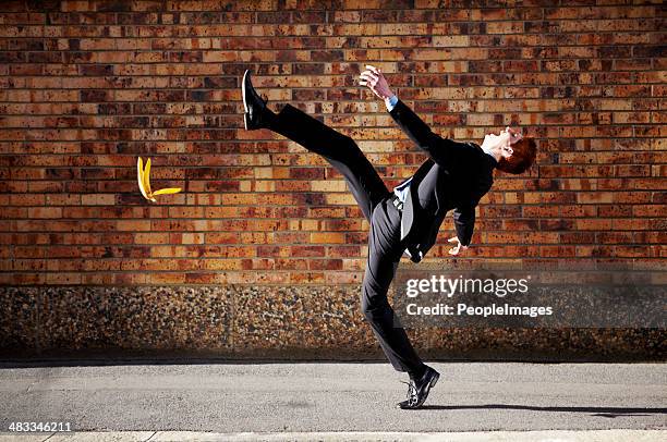 the road to success is a slippery one at best - fallen stockfoto's en -beelden