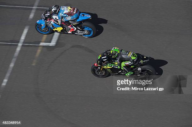 Scott Redding of Great Britain and Estrella Galicia 0,0 Marc VDS leads Pol Espargaro of Spain and Monster Yamaha Tech 3 during the MotoGp Red Bull...