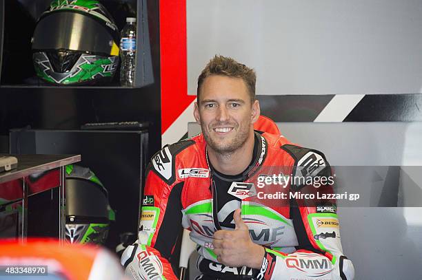 Antony West of Australia and QMMF Racing Team smiles in box during the MotoGp Red Bull U.S. Indianapolis Grand Prix - Free Practice at Indianapolis...