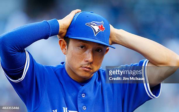 Munenori Kawasaki of the Toronto Blue Jays looks on before a game against the New York Yankees at Yankee Stadium on August 7, 2015 in the Bronx...