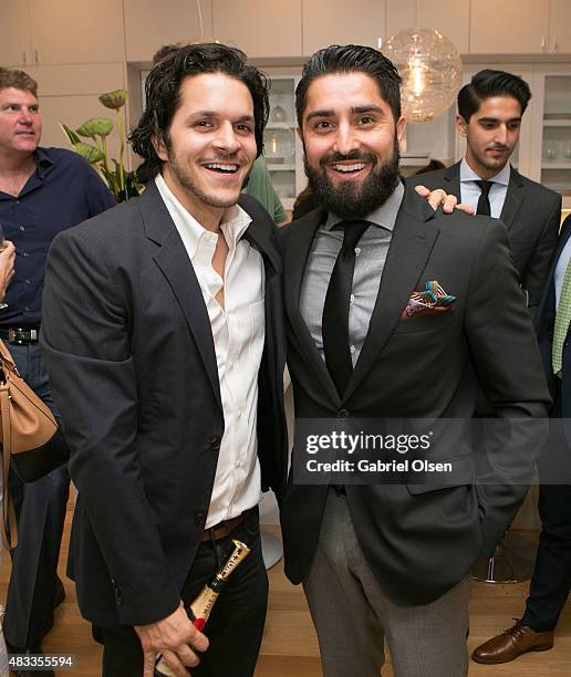 Alexander Ali of The Society Group and Roh Habibi attend the Meridith Baer Home + Teedhaze Presents The Living Art Open House At 2764 Greenwich St....