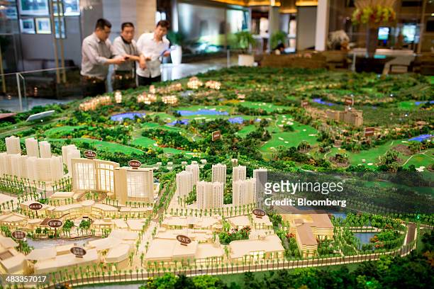 Scale model of the Mission Hills Lan Kwai Fong development and residential properties stands on display in a showroom at Mission Hills Resort Haikou...