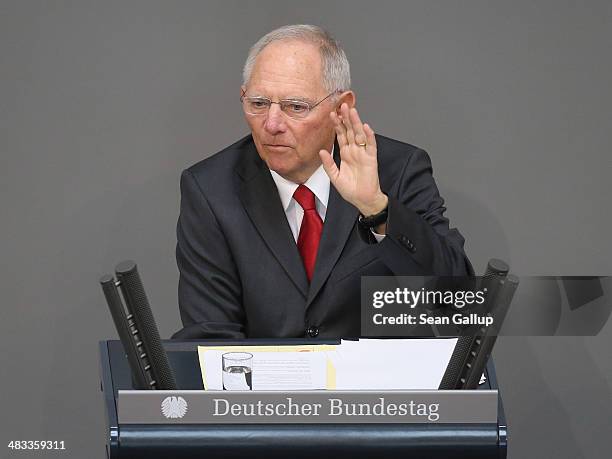 German Finance Minister Wolfgang Schaeuble speaks prior to debates over the government state budget at the Bundestag on April 8, 2014 in Berlin,...