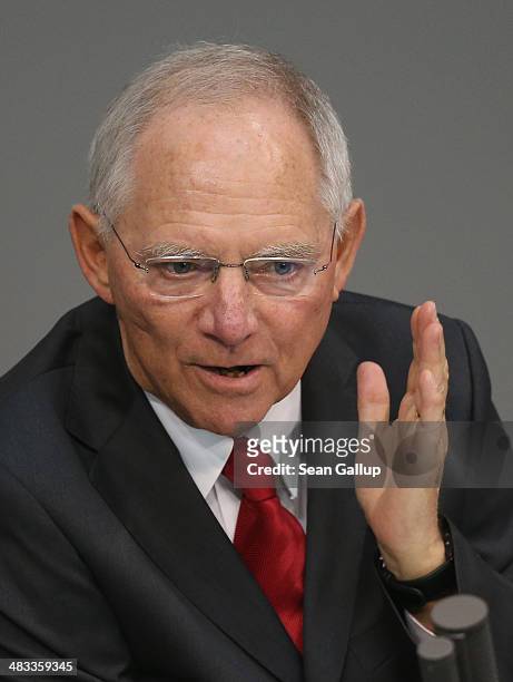 German Finance Minister Wolfgang Schaeuble speaks prior to debates over the government state budget at the Bundestag on April 8, 2014 in Berlin,...