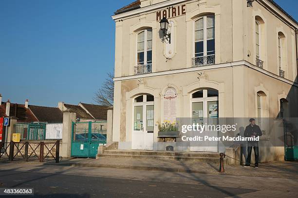 Man stands near Vareddes town hall on March 12, 2014 in Vareddes, France. A number of events will be held this year to commemorate the centenary of...