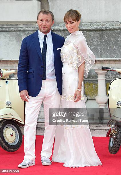 Guy Ritchie and Jacqui Ainsley attend the people's premiere of "The Man From U.N.C.L.E" during Film4 Summer Screenings at Somerset House on August 7,...