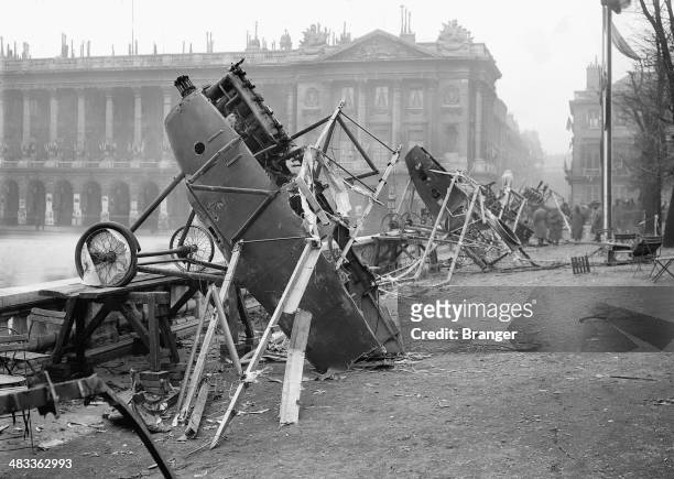 World War I, German airplanes at Place de la Concorde in Paris, wrecked by celebrating crowds on the day of the restoration of Alsace-Lorraine....