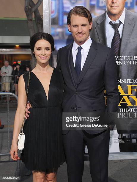 Actors Abigail Spencer and Josh Pence arrive at the Los Angeles premiere of "Draft Day" at Regency Village Theatre on April 7, 2014 in Westwood,...