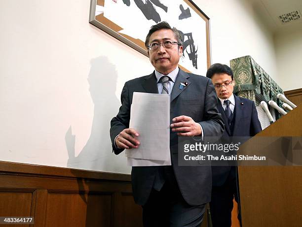 Yoshimi Watanabe, head of Your Party, leaves the conference room after announcing his intention to step down on April 7, 2014 in Tokyo, Japan. The...