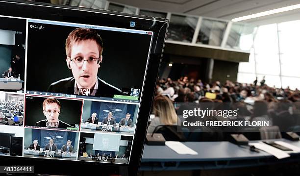 American National Security Agency whistleblower Edward Snowden speaks to European officials via videoconference during a parliamentary hearing on...