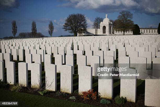 Rows of headstones are bathed in late afternoon sunshine at Tyne Cot Commonwealth War Graves Commission cemetery on March 24, 2014 in Passchendaele,...