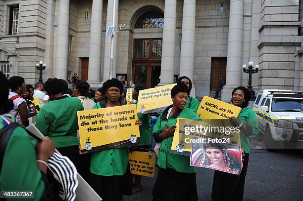 Members of the ANC Women's League protest outside the Western Cape High Court on April 8, 2014 in Cape Town, South Africa. Shrien Dewani landed in...