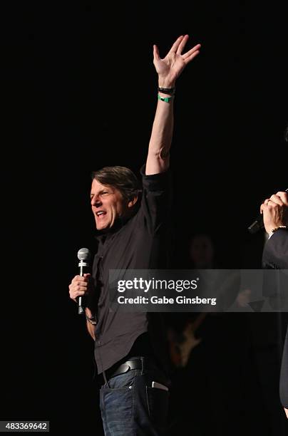 Director Adam Nimoy extends his arm with a "live long and prosper" gesture from the "Star Trek" television franchise during the "Creation...
