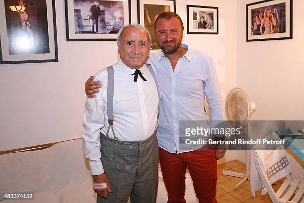 Actors Claude Brasseur and his son Alexandre Brasseur attend the 'La colere du Tigre' Theater play during the 31th Ramatuelle Festival : Day 6 on...