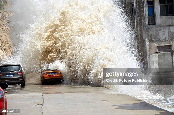 Sea tides strengthened by the approaching supertyphoon Soudelor as it hits the shore in Wenling on August 07, 2015 in Zhejiang province, China....