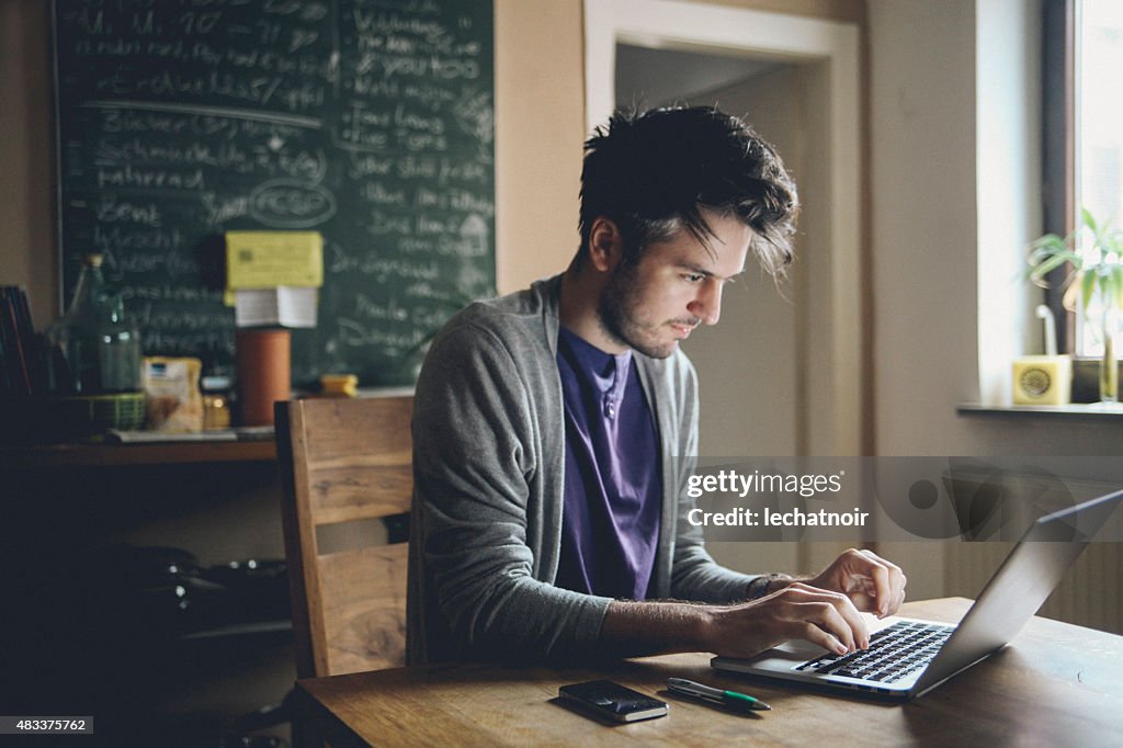 Typing on the laptop computer