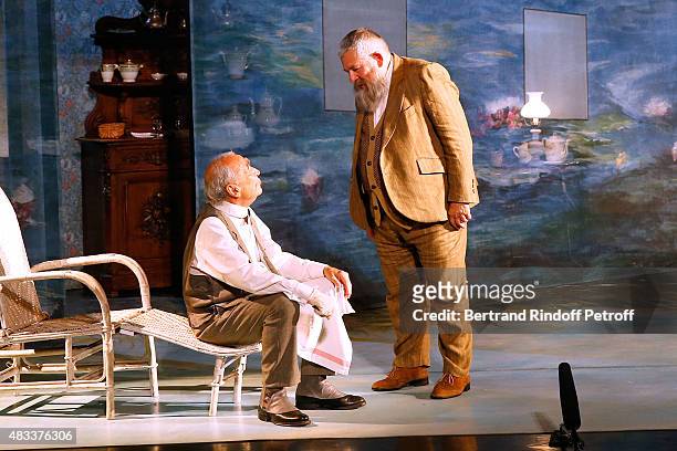 Actors Claude Brasseur and Yves Pignot perform in the 'La colere du Tigre' Theater play during the 31th Ramatuelle Festival : Day 6 on August 6, 2015...
