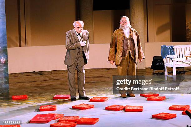 Actors Claude Brasseur and Yves Pignot acknowledge the applause of the audience whyle the traditional throw of cushions at the final of the 'La...