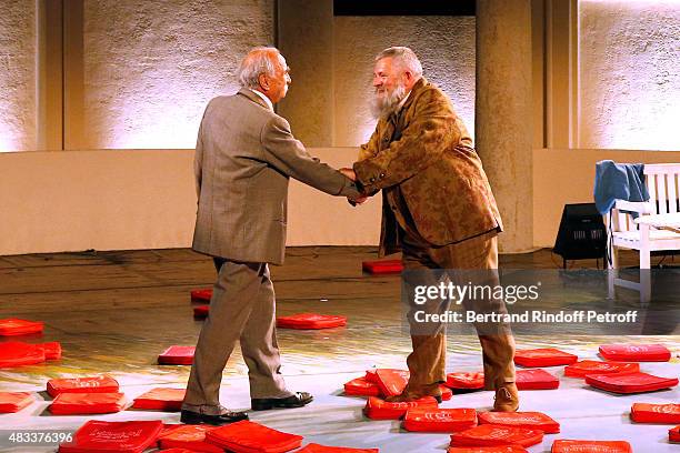 Actors Claude Brasseur and Yves Pignot acknowledge the applause of the audience whyle the traditional throw of cushions at the final of the 'La...