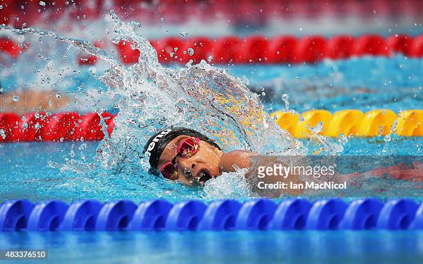 Ten year old Alzain Tareq of Barhain competes in the heats of the Women's 50m Freestyle during day Fifteen of The 16th FINA World Swimming...