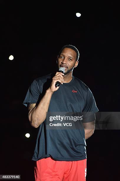 American basketball player Tracy McGrady announces his retirement during an retirement ceremony before the friendly match between NBDL and Shanghai...