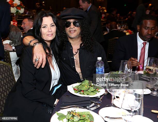 Meegan Hodges and Slash attends the 15th annual Harold & Carole Pump Foundation gala at the Hyatt Regency Century Plaza on August 7, 2015 in Century...