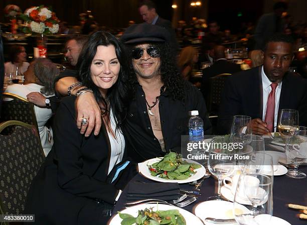 Meegan Hodges and Slash attends the 15th annual Harold & Carole Pump Foundation gala at the Hyatt Regency Century Plaza on August 7, 2015 in Century...