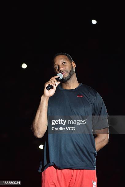 American basketball player Tracy McGrady announces his retirement during an retirement ceremony before the friendly match between NBDL and Shanghai...