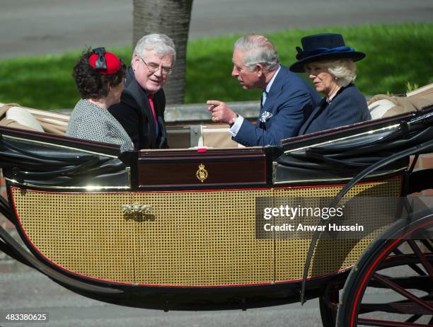 Prince Charles Prince of Wales, Camilla, Duchess of Cornwall and Irish Foreign Minister Eamon Gilmore leave the ceremonial welcome for the Irish...