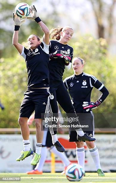 Goalkeeper Nadine Angerer makes a save during a Germany Women's Training Session at SC Kaefertal Training Ground on April 8, 2014 in Mannheim,...