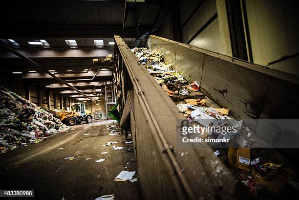 garbage recycling plant - garbage dump stock pictures, royalty-free photos & images