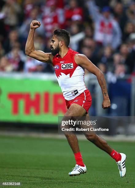 Lewis Jetta of the Swans celebrates after scoring a goal during the round 19 AFL match between the Geelong Cats and the Sydney Swans at Simonds...