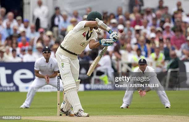 Australia's Mitchell Starc edges to England's Ian Bell as Australia lose their first wicket of the morning during play on the third day of the fourth...