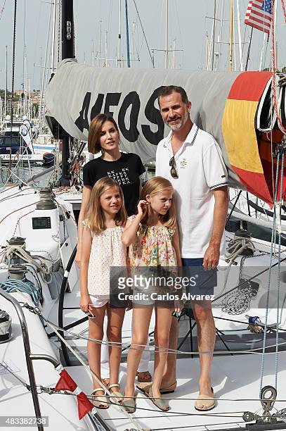 King Felipe VI of Spain, Queen Letizia of Spain and their daugthers Princess Leonor of Spain and Princess Sofia of Spain visit the Aifos boat during...