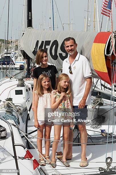 King Felipe VI of Spain, Queen Letizia of Spain and their daugthers Princess Leonor of Spain and Princess Sofia of Spain visit the Aifos boat during...