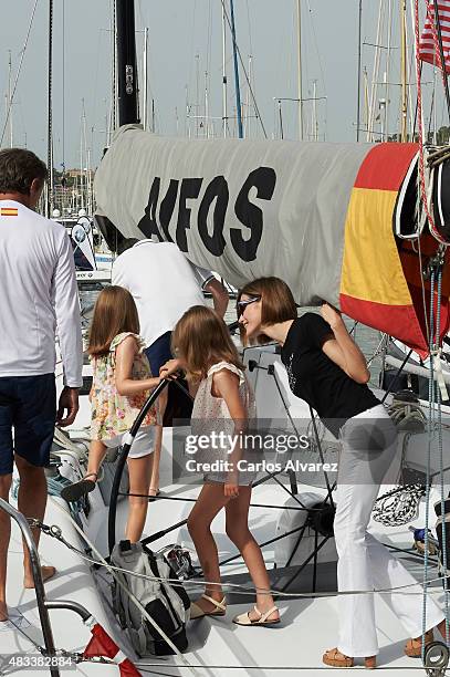 King Felipe VI of Spain, Queen Letizia of Spain and their daugthers Princess Leonor of Spain and Princess Sofia of Spain visit the Aifos boat during...