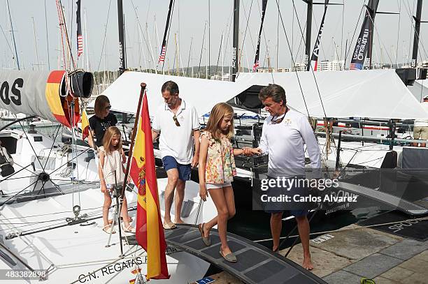 King Felipe VI of Spain, Queen Letizia of Spain and their daugthers Princess Leonor of Spain and Princess Sofia of Spain visit the Aifos boat during...