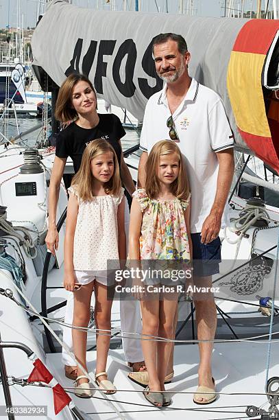 King Felipe VI of Spain, Queen Letizia of Spain and their daugthers Princess Leonor of Spain and Princess Sofia of Spain visit the Aifos boat during...