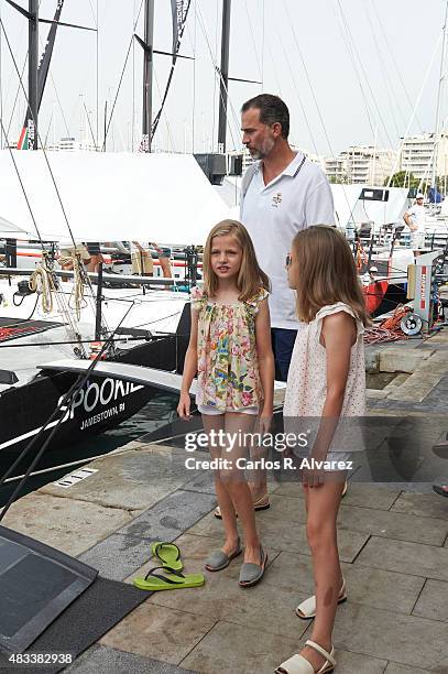 King Felipe VI of Spain and his daugthers Princess Leonor of Spain and Princess Sofia of Spain visit the Aifos boat during the last day of 34th Copa...