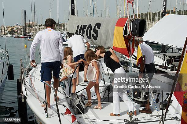 King Felipe VI of Spain, Queen Letizia of Spain and their daugthers Princess Leonor of Spain and Princess Sofia of Spain visit the Aifos boat during...