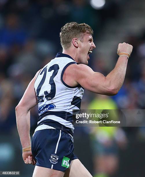 Josh Caddy of the Cats celebrates after scoring a goal during the round 19 AFL match between the Geelong Cats and the Sydney Swans at Simonds Stadium...