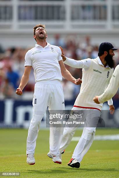 Mark Wood of England celebrates after taking the wicket of Nathan Lyon of Australia to reclaim the Ashes during day three of the 4th Investec Ashes...
