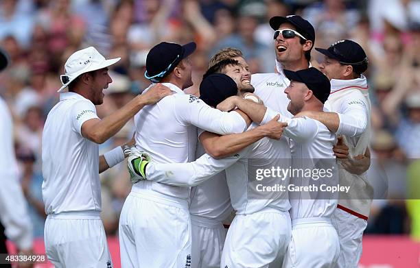 England players celebrate after Mark Wood of England takes the final wicket to win the 4th Investec Ashes Test match between England and Australia at...