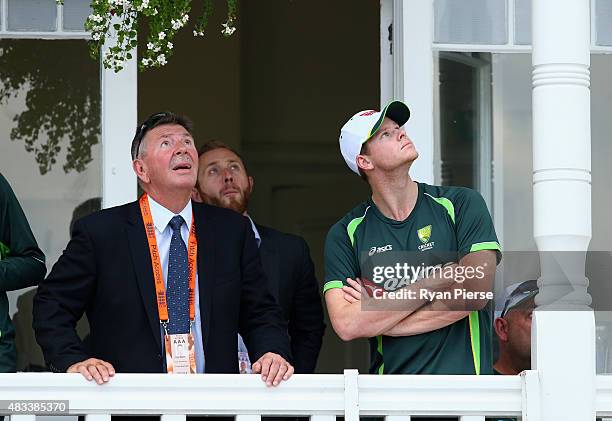 Australian Chairman of Selectors Rod Marsh, Australian Team Manager Gavin Dovey, and Steve Smith of Australia look on after day three of the 4th...